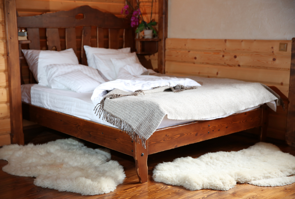 bed in a wooden cabin